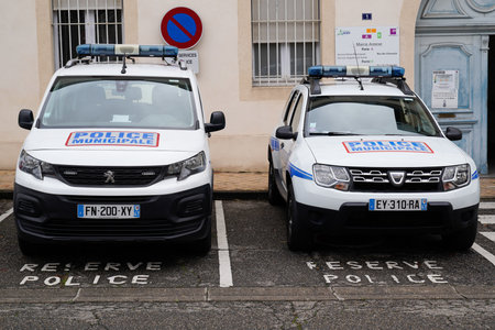 agen, Aquitaine France - 12 10 2021: police municipale french peugeot partner and dacia duster car Municipal police with stickers logo sign text front of facade officeのeditorial素材