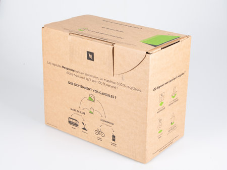 Bordeaux, Aquitaine France - 12 20 2021: Nespresso sign logo and brand text on deliver box of coffee capsule in brown delivery boxes capsules machineのeditorial素材