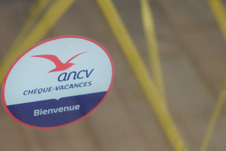 Bordeaux, Aquitaine France - 06 06 2021: check vacances label signage ancv logo brand and text sign sticker on facade entrance door windows hotel restaurant frenchのeditorial素材