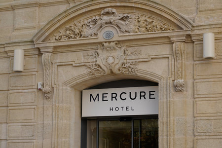 Bordeaux, Aquitaine France - 12 20 2021: mercure hotel text brand and sign logo on door entrance building facade in cityのeditorial素材