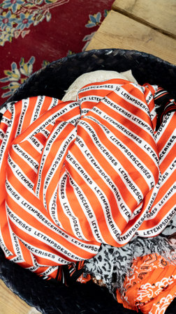 Bordeaux, Aquitaine France - 12 20 2021: le temps des cerises piece of fabric scarf headscarf with text sign and logo brand of store signage French shop chain of streetwear fashion clothingのeditorial素材