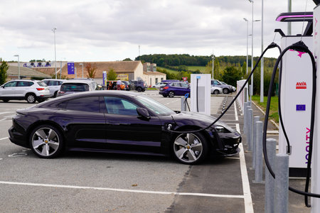 Bordeaux, Aquitaine France - 12 20 2021: Porsche taycan turbo S luxury sporty electric car fully sports ev vehicle in charge stationのeditorial素材