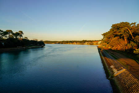 Hossegor lake with blue calm water in landes franceの写真素材