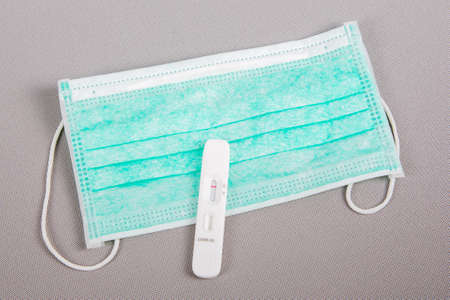 surgical mask COVID-19 during the pandemic and antigen testの写真素材