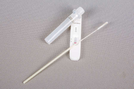 PCR test to COVID-19 coronavirus swab collection kit in close-up