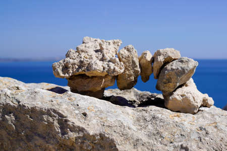 spa stones balance rock bridge on beach