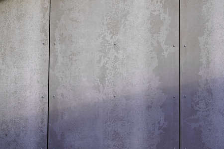 Gray cement steel old background Wall texture ancient wallpaperの写真素材