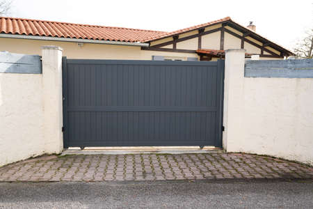 suburb portal home gray high sliding long door house gate access garden