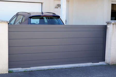portal aluminum sliding gray metal gate of modern gray suburb house entrance