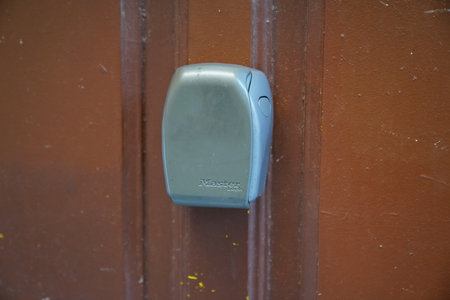 Bordeaux , Aquitaine France - 03 07 2022 : Master Lock padlock on home door Wall Lock Box with text...