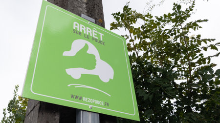 Bordeaux , Aquitaine France - 03 12 2022 : arret sur le Pouch french text sign of hitchhiking stopping point and stopping car with thumbs up design on road panelのeditorial素材