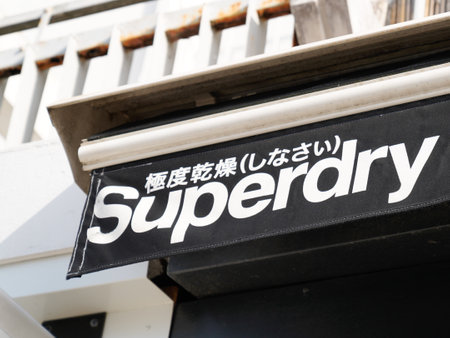 Bordeaux , Aquitaine France - 03 27 2022 : Superdry store brand text and sign logo wall entrance...