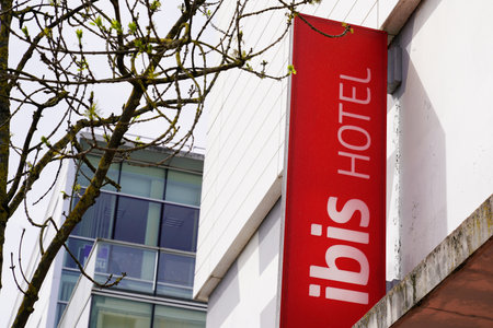 Bordeaux , Aquitaine France - 04 04 2022 : ibis sign logo and brand text hotel wall facade buildingのeditorial素材