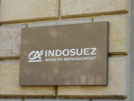 Bordeaux , Aquitaine France - 04 04 2022 : ca indosuez wealth management brand sign text and logo of Credit Agricole french bank on facade agency office buildingのeditorial素材