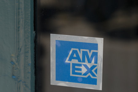 Bordeaux , Aquitaine France - 04 04 2022 : american express logo brand and sign text on door windows shop of Amex US financial service company pay cards storeのeditorial素材