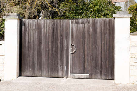 door wooden gate facade in street view outdoor home portal wood entrance