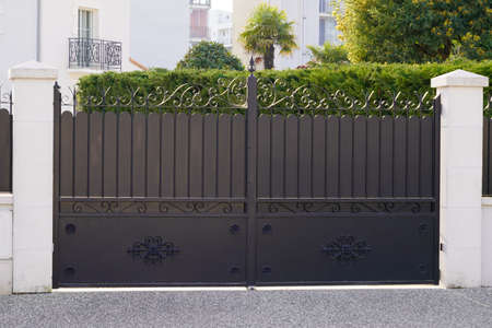 black vintage steel gate house portal of classical traditional european houseの写真素材