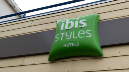 Bordeaux , Aquitaine France - 04 24 2022 : ibis style green pillow sign logo and brand text hotel wall facade building windowsのeditorial素材