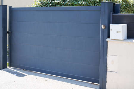 portal gray high slide modern home steel gray door aluminum sliding gate slatsの写真素材