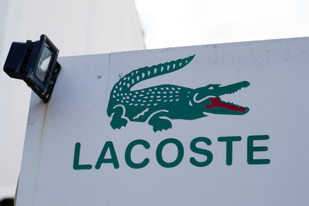 Bordeaux , Aquitaine France - 05 17 2022 : Lacoste brand logo in interior mall shop sign text on wall store front boutiqueのeditorial素材