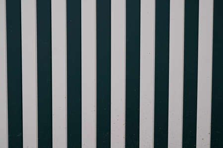 Wooden vertical background wood line construction old planks white and dark gray facadeの写真素材