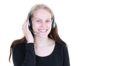 young happy woman is working in a call center on the phone headset next to an empty white background...