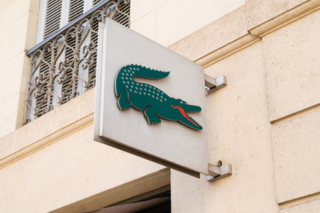 Bordeaux , Aquitaine France - 06 25 2022 : lacoste logo brand and text sign on wall facade store fashion city streetのeditorial素材