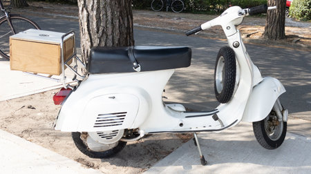 Bordeaux , Aquitaine France - 07 25 2022 : Vespa old vintage retro scooter white in sixties concept parked streetのeditorial素材