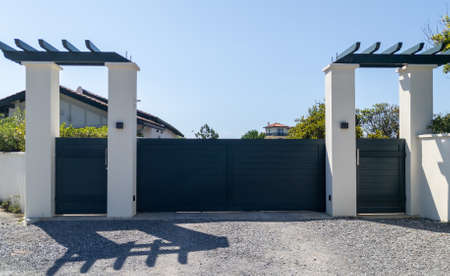 modern home gray gate portal of suburb door house facade