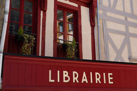 bookstore bookshop text in french translation means in english book library shop vintage signage wooden panel retro bookstore sign in city streetの写真素材