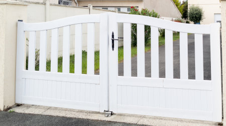 plank gate suburb white house portal with slatsの写真素材