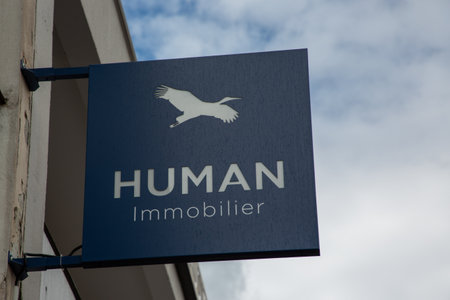 Bordeaux , Aquitaine France - 10 10 2022 : human immobilier sign brand and bird text logo facade french real estate wall facade broker office company agencyのeditorial素材