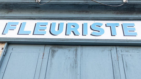 florist french text means florist flowers shop sign facade boutique of store flower in retro vintage facadeの写真素材