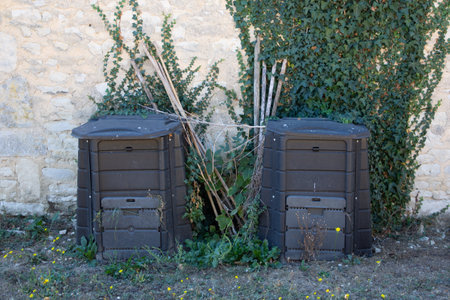 Compost recycled plastic duo composter at the bottom of the garden silos backyard