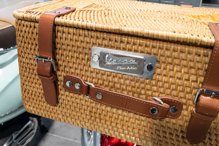 Bordeaux , Aquitaine France - 12 15 2022 : vespa text sign on top case wicker basket with brand logo on new modern retro style of scooter pic nic limited edition vintage lookのeditorial素材
