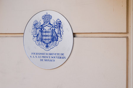 Monte Carlo , Monaco - 28 12 2022 : official patented supplier of the sovereign prince of monaco logo brand and text sign on wall entrance shopのeditorial素材