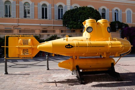 Monte Carlo , Monaco - 28 12 2022 : yellow submarine front square Monaco Oceanographic museum facadeのeditorial素材