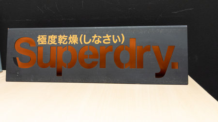 Bordeaux , Aquitaine France - 01 18 2023 : superdry logo sign and brand text in store clothing shop...