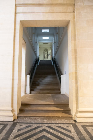 Bordeaux , Aquitaine France - 01 18 2023 : courtyard in bordeaux with old corridor and stairs interiorのeditorial素材