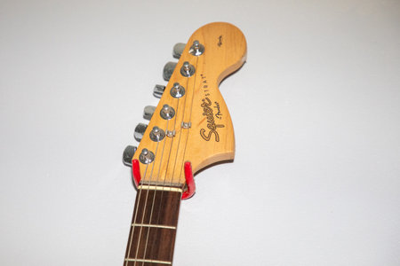 Bordeaux , Aquitaine France - 06 02 2023 : Fender squier strat Guitar brand logo and text sign electric guitar head detailのeditorial素材