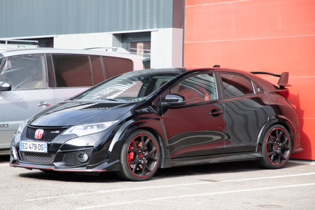 Bordeaux , Aquitaine France - 02 20 2023 : Honda civic type R High Performance Hatchback black fenders and rear spoiler racingのeditorial素材