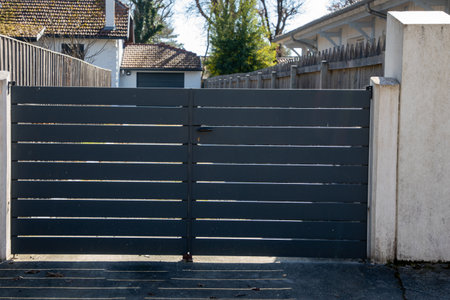 Aluminum design gray metal double gate of modern suburb house high entrance closed doorの写真素材