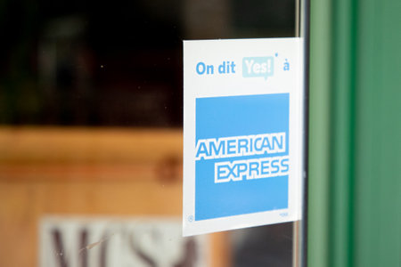 Bordeaux , Aquitaine France - 03 10 2023 : amex american express logo brand and text sign on entrance windows door store of Amex US financial service company pay cardのeditorial素材