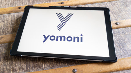 Bordeaux , Aquitaine France - 03 15 2023 : Yomoni logo brand and text sign of french insurance life Bank online banking brokerage financial information on tablet screen internetのeditorial素材