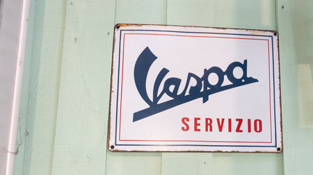 Bordeaux , Aquitaine France - 03 19 2023 : vespa servizio old logo brand and ancient text sign on panel service piaggio scooterのeditorial素材