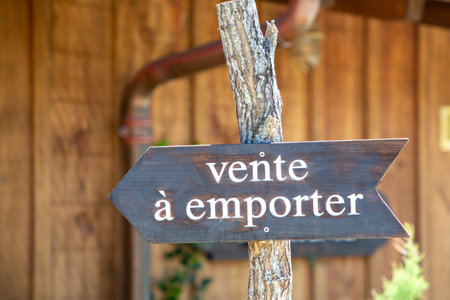 takeaway sign text means takeaway in wooden arrow outdoor fastfood restaurantの写真素材