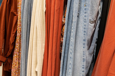 Shopping background with jeans dress vest T-shirt at market Summer fashion female shirt in shop