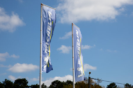 Bordeaux , Aquitaine France - 04 02 2023 : michelin sign logo and brand text on pole manufacturer distributor of car tires vehiclesのeditorial素材