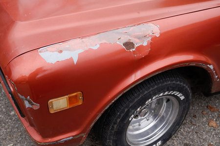 Bordeaux , Aquitaine France - 04 10 2023 : rust punctured car truck fender with offroad tires Dunlop GT Qualifierのeditorial素材