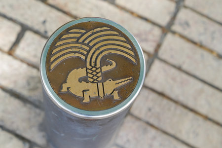 Nimes , Occitanie France - 04 10 2023 : Nimes emblem coat of arms of the city of Nimes Franceのeditorial素材